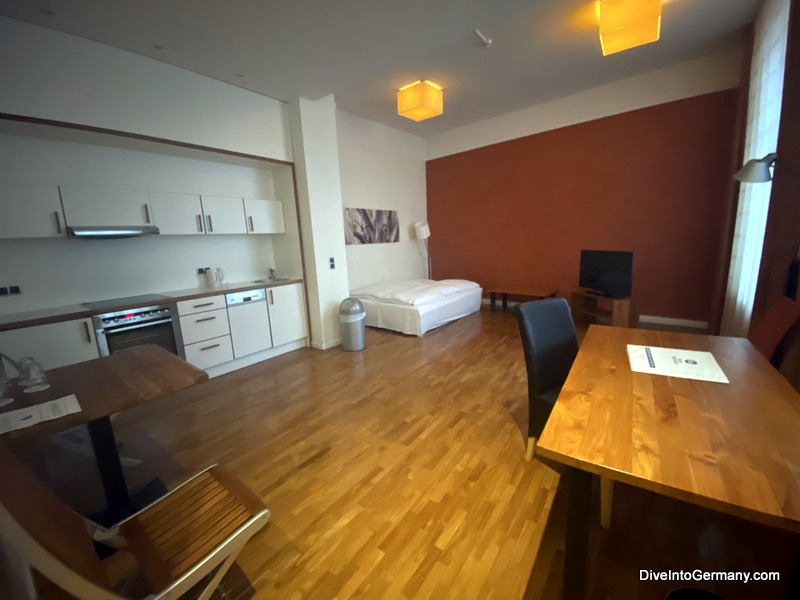 Business apartment Living area/kitchen/second bedroom at Best Western Bremen City